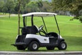 A golf cart park on street in golf course Royalty Free Stock Photo