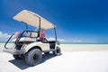 Golf cart at tropical beach Royalty Free Stock Photo