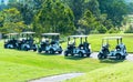Golf carts on a golf course Royalty Free Stock Photo