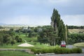 Golf carts on landscape Royalty Free Stock Photo