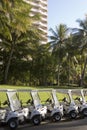 Golf carts line Hamilton Island Royalty Free Stock Photo