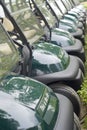 Golf carts in a row Royalty Free Stock Photo