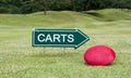 The golf carts sign on a golf field Royalty Free Stock Photo