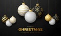 Golf Christmas card. Merry Christmas sport greeting card. Hang on a thread golf ball as a xmas ball and golden bauble on black Royalty Free Stock Photo