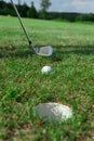 Golf club: ball close to the hole Royalty Free Stock Photo