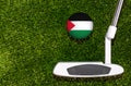 A golf club and a ball with flag Palestine during a golf game