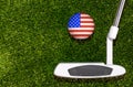 A golf club and a ball with flag USA during a golf game Royalty Free Stock Photo