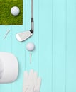 Golf club, golf ball, golf glove and tees on wooden base in turquoise