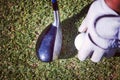 Golf club and ball in grass Royalty Free Stock Photo