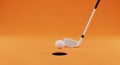Golf club and ball on orange background ready for swing Royalty Free Stock Photo