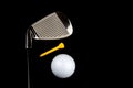 Golf Club with Ball and Tee on Black Background Royalty Free Stock Photo