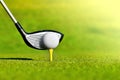 Golf club and ball on tee Royalty Free Stock Photo