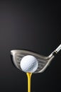 Golf club and ball on tee. Royalty Free Stock Photo