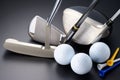 Golf clubs, driver, iron, putter, balls and tees.