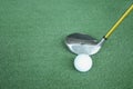 Golf clubs and golf balls on green artificial grass At the golf Royalty Free Stock Photo