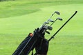 Golf Clubs green , bag on the   fairway Royalty Free Stock Photo