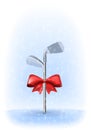 Golf clubs tied with a red bow