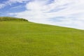 Golf course in Belek. Green grass on a field. Blue sky, sunny da