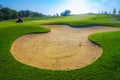 Nice golf course with bunker and nice green Royalty Free Stock Photo