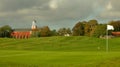 Golf course with a church Royalty Free Stock Photo