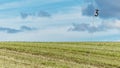 Golf course countryside field with flag and clear sky Royalty Free Stock Photo