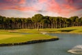 Golf course at sunset with beautiful sky Royalty Free Stock Photo