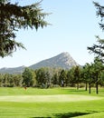 Golf course in Estes Park Colorado with view of the Rocky Mountains in the distance Royalty Free Stock Photo