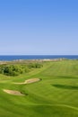 Golf course green grass near sea ocean Royalty Free Stock Photo