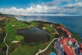 Golf course in luxury resort next to the sea cliffs. Aerial view Royalty Free Stock Photo