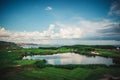 Golf course in luxury resort with players. Aerial view of golfer Royalty Free Stock Photo