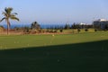 Golf course at the ocean side at sunset Royalty Free Stock Photo