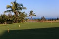 Golf course at the ocean side at sunset Royalty Free Stock Photo