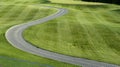 A golf course with roads, bunkers and ponds Royalty Free Stock Photo