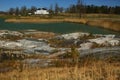 A golf course with roads, bunkers and ponds and with stones Royalty Free Stock Photo