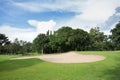 Golf course with sand bunker and green Royalty Free Stock Photo