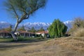 Golf Course sand traps and fairways with mountains in the background. Royalty Free Stock Photo