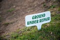 golf course sign ground under repair on greens and rough Royalty Free Stock Photo
