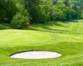 Golf course. Spring landscape with green grass field Royalty Free Stock Photo