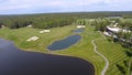 Golf course on a Sunny day, an excellent Golf club with ponds and green grass, view from the sky Royalty Free Stock Photo