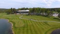 Golf course on a Sunny day, an excellent Golf club with ponds and green grass, view from the sky Royalty Free Stock Photo