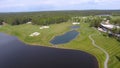 Golf course on a Sunny day, an excellent Golf club with ponds and green grass, view from the sky Royalty Free Stock Photo