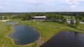 Golf course on a Sunny day, an excellent Golf club with ponds and green grass, view from the sky Royalty Free Stock Photo