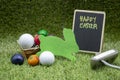 Golf Easter with golf ball and Easter eggs on green grass Royalty Free Stock Photo