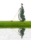 Golf equipment , golf bag ,putter ,ball on green with beautiful light reflect on the water isolated on white background Royalty Free Stock Photo