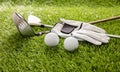 Golf equipment on green grass golf course, close up view Royalty Free Stock Photo