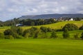 A golf fairway and in the parkland course in the Roe river valley near Limavady in Northern Ireland with the magnificent Bie Royalty Free Stock Photo