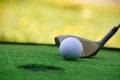 Golf field hole with cross and ball Royalty Free Stock Photo