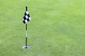 Golf flag on green Royalty Free Stock Photo