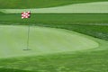 Golf flag on a green Royalty Free Stock Photo