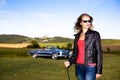 Golf Girl and a classic car Royalty Free Stock Photo